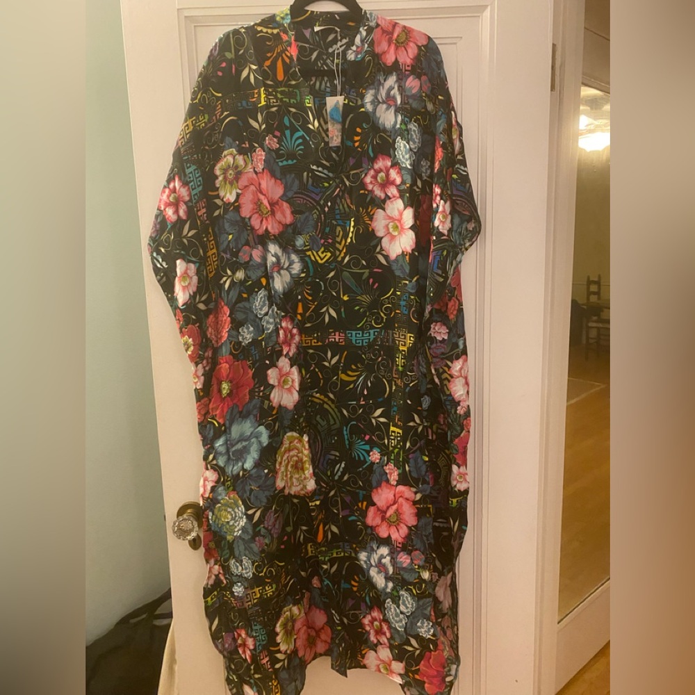 NWT and in packaging - Johnny was brand swimsuit cover up cover up. Size s/m